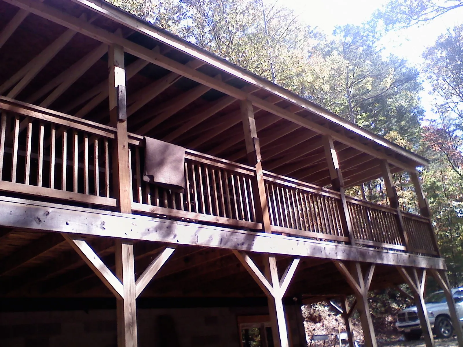Timber framing under a new elevated porch and deck — Roof Leak Repair in Fayetteville by Roofing Brothers